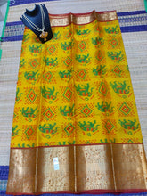 Kanjivaram softsilk saree in yellow with maroon pochampalli double warp with silver jari