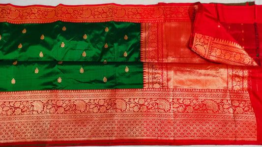 Beautiful katan Banaras Kaduva butta saree in green with red Christmas colours