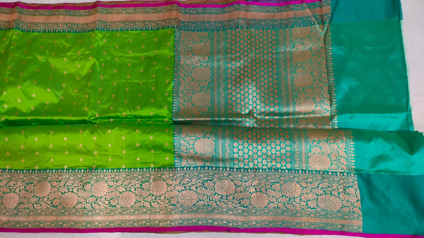 Beautiful tussar Banaras Kaduva butta saree in apple green and leaf greem