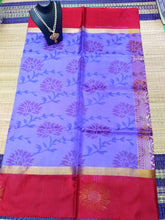 Kanjivaram softsilk saree in Ikkat lavender with red flowered pochampalli double warp with golden jari Borderless silk saree