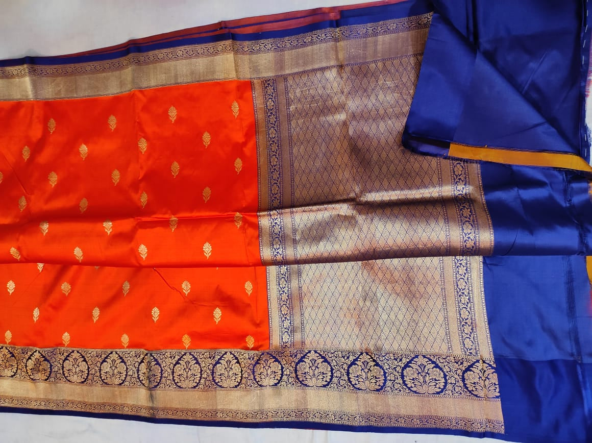Pure Katan Banarasi in oranch with navy Color Saree