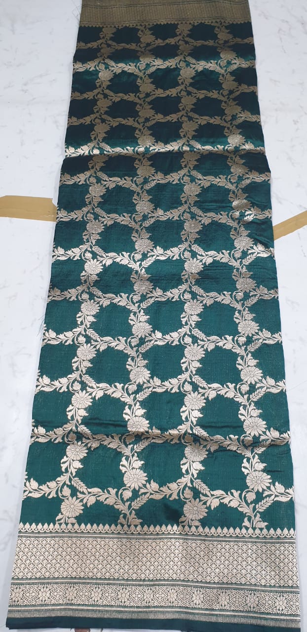 Katana by katan Banarasi full body weaving jaal saree in deep sea green color