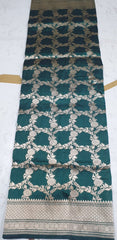 Katana by katan Banarasi full body weaving jaal saree in deep sea green color