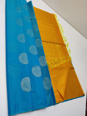 Cotton silk pure borderless in blue color with golden butti and Golden yellow mundi