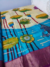 Pure Zari tussar silk saree silk in kalamkari hand painted in cream Color with blue color lotus and fish story